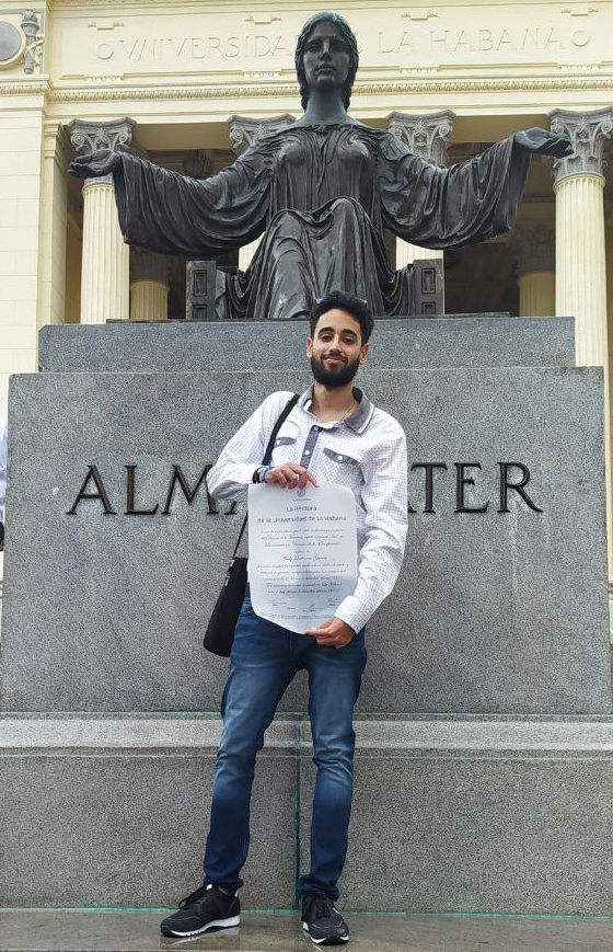 Andy graduating at the University of Havana